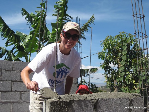 Author doing volunteer work building a home in Honduras.