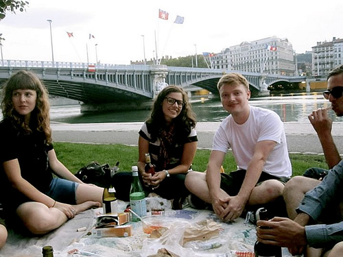 Author at picnic with friends near Rhone river in Lyon, France.