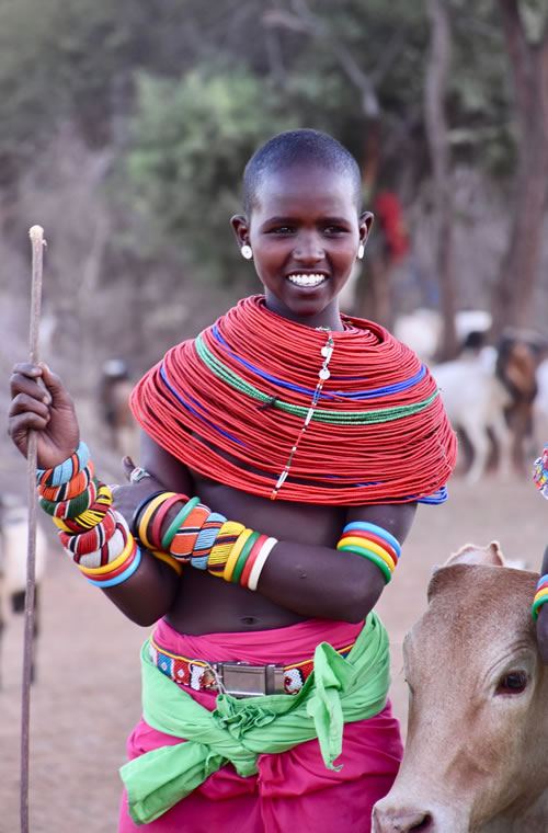 Samburu girl herding cattle
