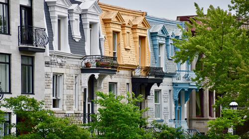 Colorful row houses in the trendy Plateau neighborhood in Montreal.