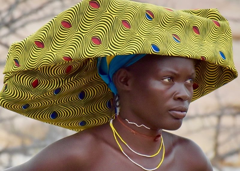 Mucubal woman with the traditional ompota headdress in South Angola.