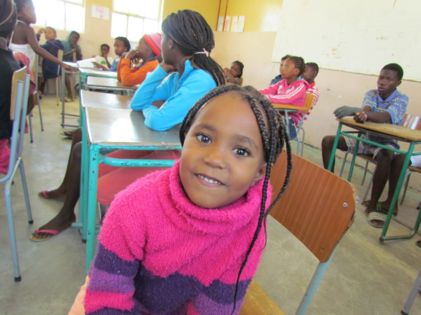 Volunteer teach children in Namibia.