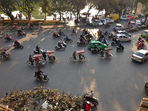 Traffic of all kinds in Hanoi, Vietnam.