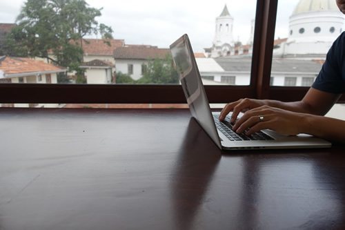 Blogging abroad on a laptop develops online digital skills
