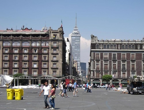 Mexico City old and new at a central plaza.