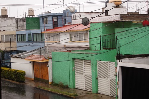 Houses in Mexico with electrical wires.
