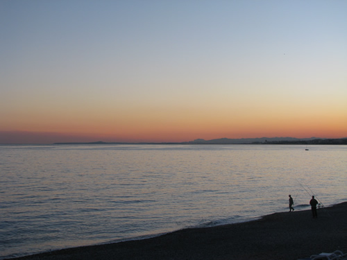 Learn and listen to language of the waves at sunset in Nice, France.