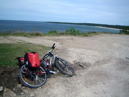 Biking in Estonia in the Baltics, leaving the bike behind to go to the beach.
