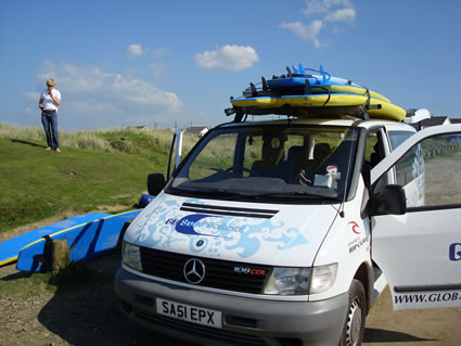 Surfboards loaded on van in Cornwall, England.