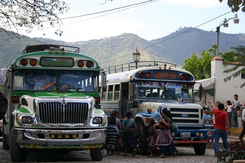 Colorful public buses in Antigua.