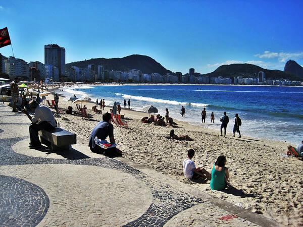 Staying safe while relaxing at the Copacabana  beach in busy Rio de Janeiro, Brazil.