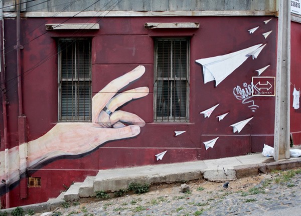 A trompe l'oeil mural adorns a building on Templeman Street in Valparaiso, Chile.