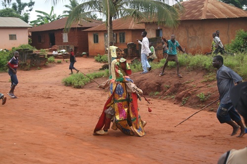 Egun dancers resting in Burkina Faso