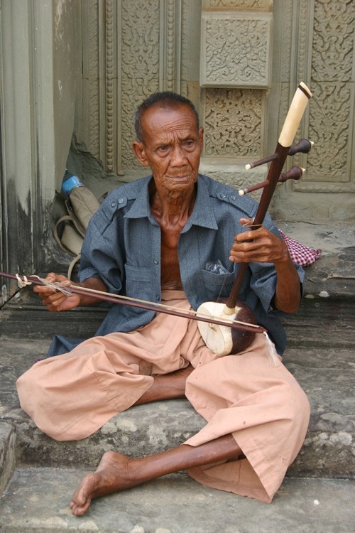 Qok playing his thro in Cambodia.