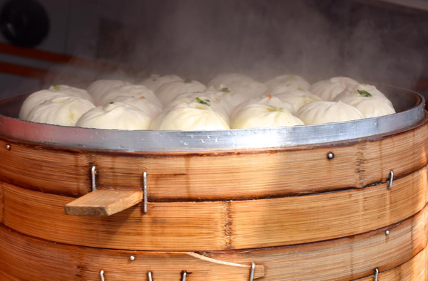 Bamboo steaming basket with dumplings in Guangzhou.