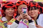 Girls at festival in Guizhou Province.