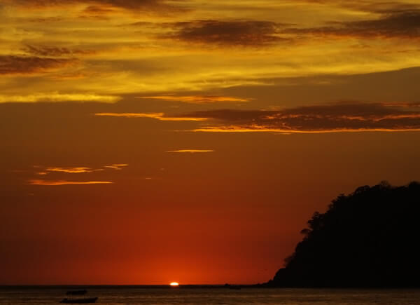 Sunst with an orange sky in Samara, Costa Rica.