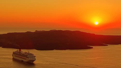 Sailing from Santorini into the sunset.
