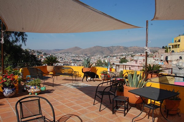 A roof terrace overlooking the city of Guanajuato.