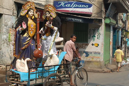 Saraswati goddesses by tricycle in Kolkata.