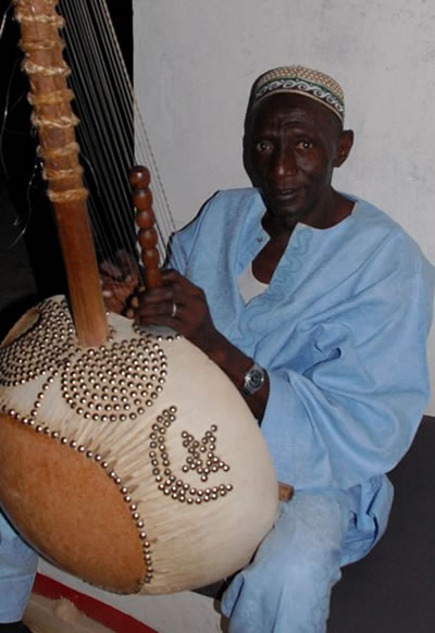 Basuru Jobarteh playing the Kora in The Gambia.