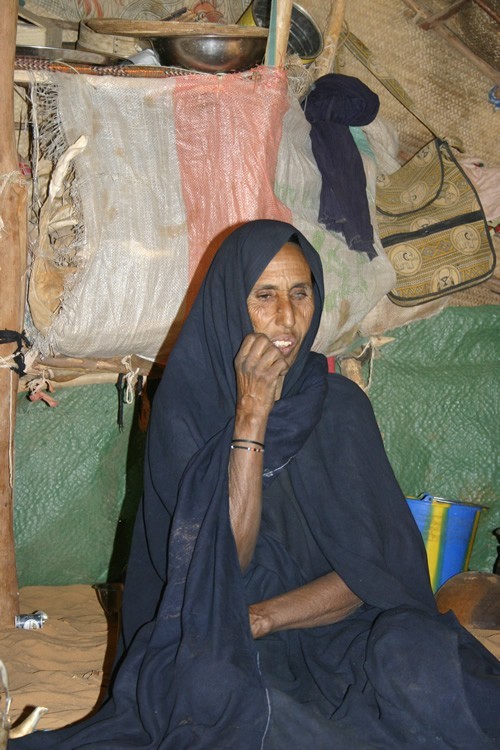 A Tuareg woman sitting in a Yurt.
