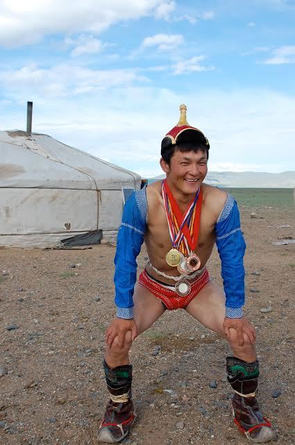 Son in Mongolian wrestling outfit.
