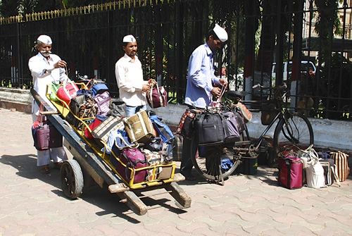 Dabbawalas in action at Churchgate Station in Mumbai.