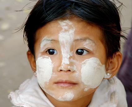 Child with thanaka paste in Myanmar.