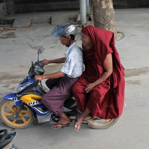 Monk on a motorbike in Myanmar.
