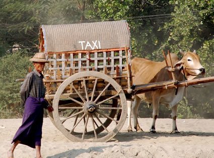 Man with taxi cart in Myanmar.