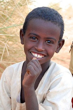 Hospitable boy in Sudan.