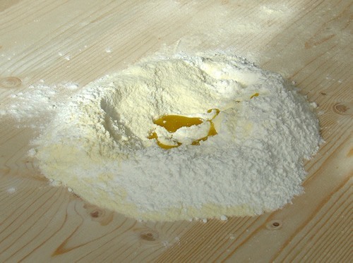 Mounds of blended flour olive oil for the pasta.