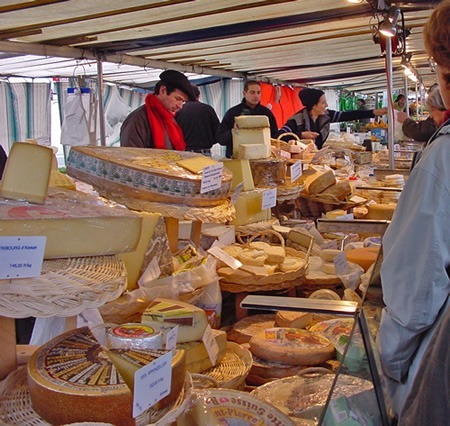 French cheeses galore at the market in Paris.