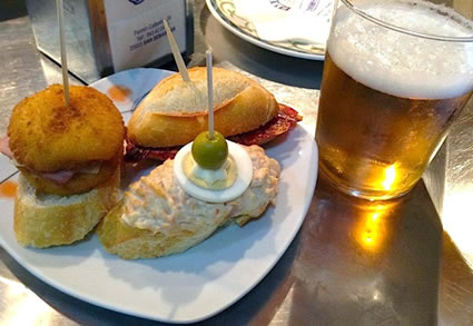 Typical variety of pintxos and a beer.