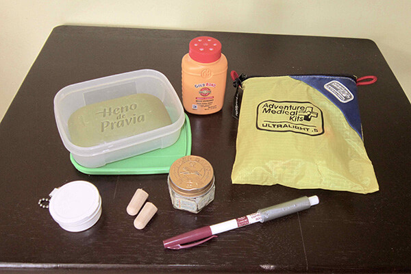 Basic elements of medical kit to pack abroad and travel light.