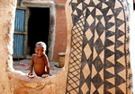 Why I Travel: Boy in Burkina Faso.