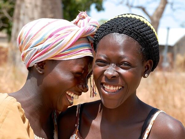 Giggling teen girls in the Gambia.