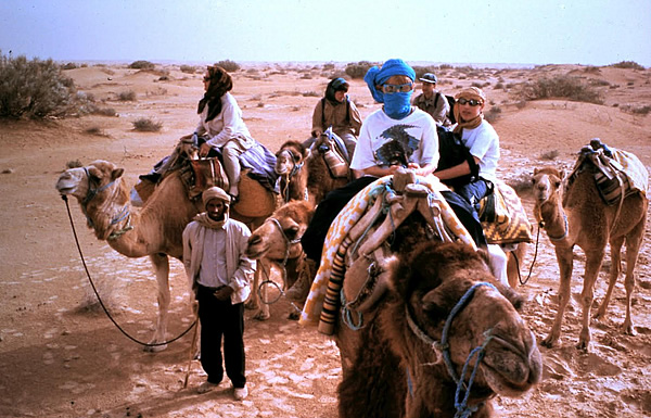 Family and children after night in Sahara Desert.