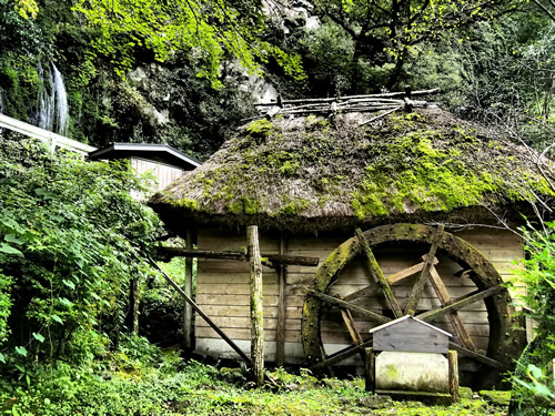 Hut and waterwheel in Japan.