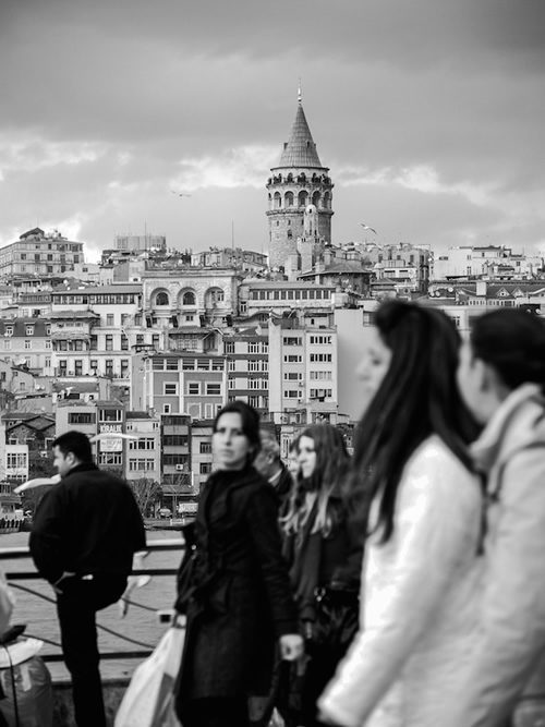 People waiting in front of the Galata Tower in Istanbul, Turkey.