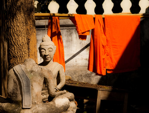 Buddha statue in a courtyard.
