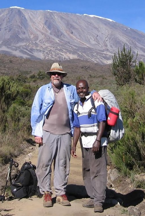 Author and Geoffrey on Kilimanjaro.