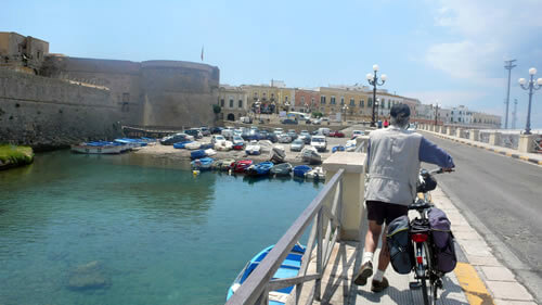 Walking into the Island of Gallipoli with a packed bike.