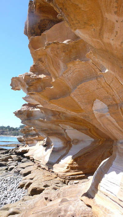 Maria Island Cliffs are painted and jagged in Tasmania.