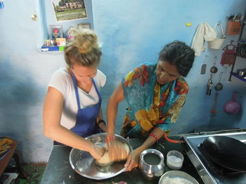 Folding pakora with Sashi at her cooking school in India.
