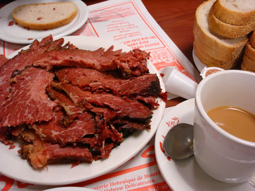 Montreal where you can enjoy coffee and smoked meat.