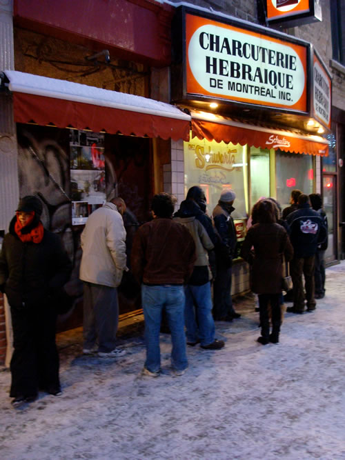 Waiting in line for the famous fare at Schwartz's delicatessen in Montreal.