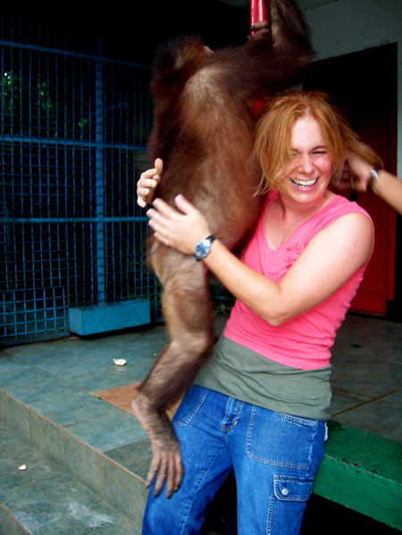 [Image: sarah-maurer-with-orangutan.jpg]