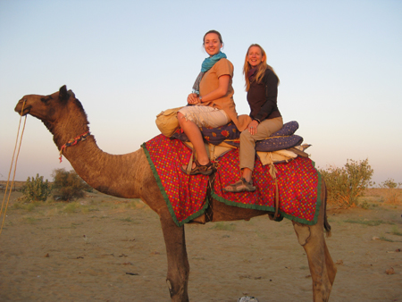 Women on camel in India.